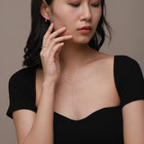 Model wearing Freshwater pearl and diamond solid gold jewellery