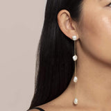 Long dangling freshwater pearl and solid gold earring