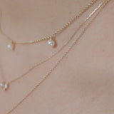  Layered freshwater pearl and solid gold necklaces