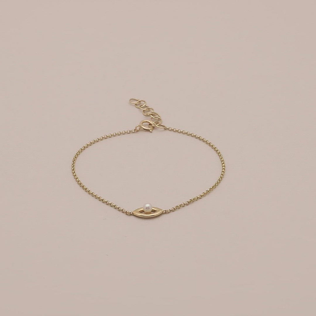 Video of Evil eye solid gold and freshwater pearl bracelet