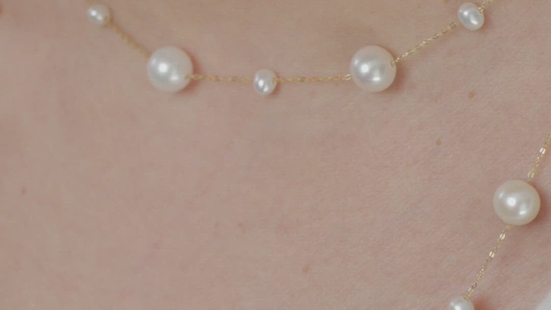 Video of model wearing long freshwater pearl and solid gold necklace