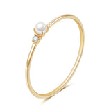 Dainty pearl and diamond ring