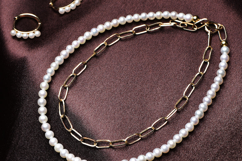 Mini freshwater pearl and solid gold jewellery