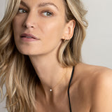 Model wearing Diamond and freshwater pearl solid gold jewellery