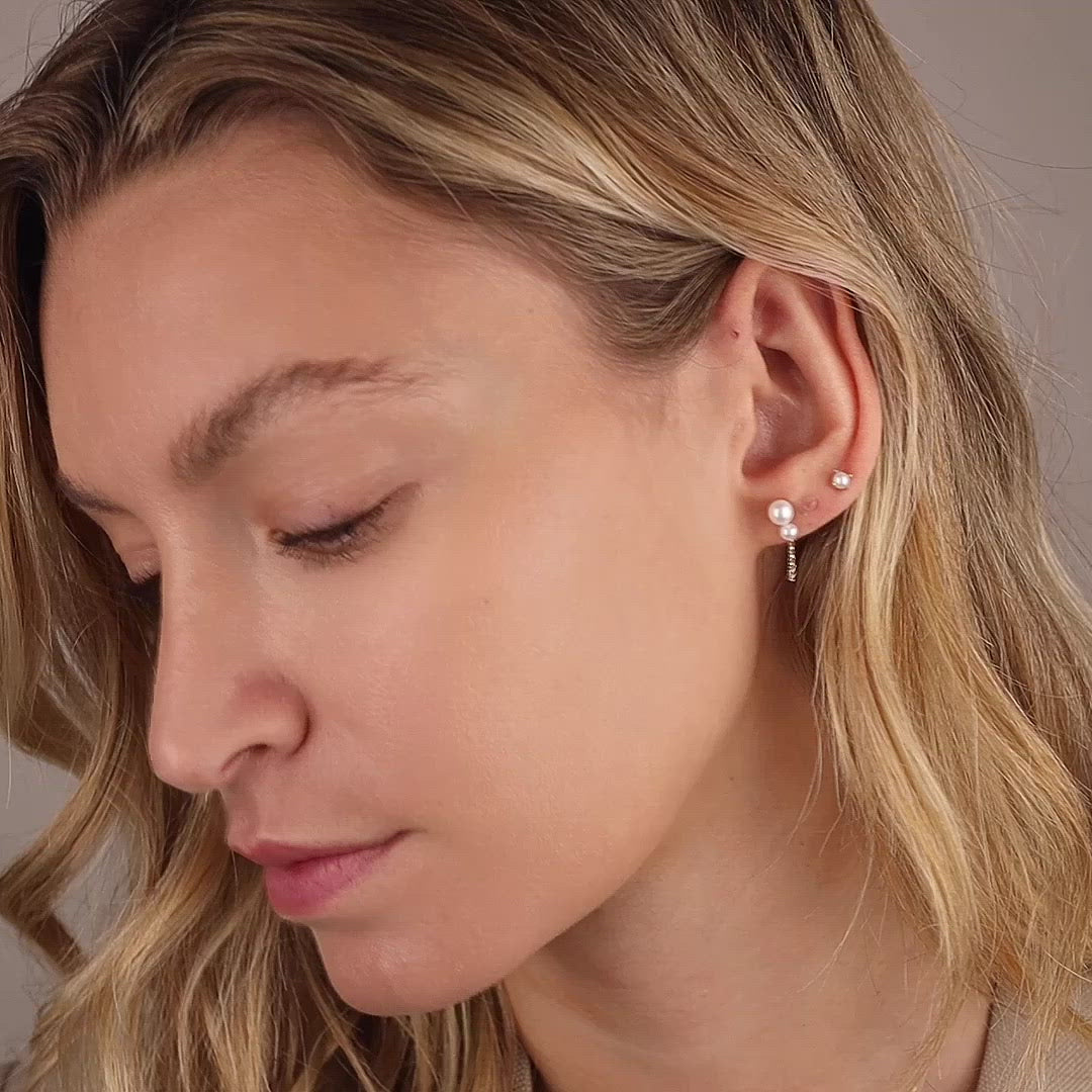 Video of model wearing freshwater pearl and solid gold earring