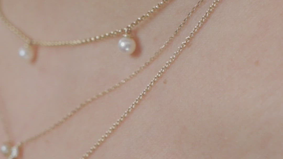 Video of Diamond and freshwater pearl solid gold necklace