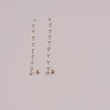 Video of mini freshwater pearl and solid gold cascading earring