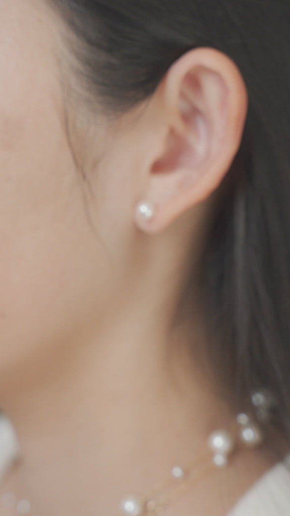 Video of model wearing freshwater pearl and solid gold earrings
